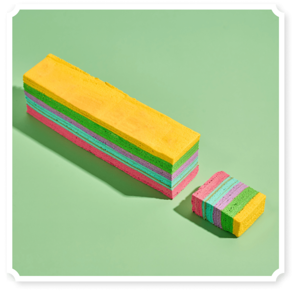chempiyen (strawberry, Blueberry & Cheese) distinct, even layers in yellow, green, pink, purple, and blue, arranged in a repeating pattern